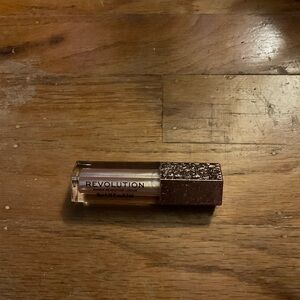 Revolution Luxurious Lip Gloss with Glittery Brown Cap